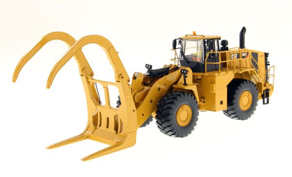 DCM85917 - Caricatore per legname CATERPILLAR 988K su pneumatici con conducente e cassone metallico - 1