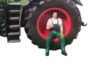 ATLAN32025_VERT - Uomo seduto in pausa verde