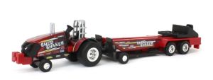 ERT47619 - CASE IH Magnum che traina un rimorchio SHED SHAKER