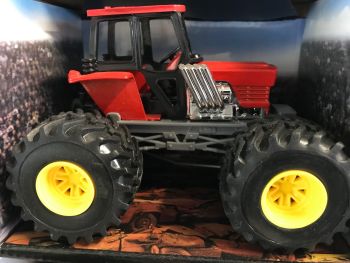 NEW19936E - Monster truck trattore rosso e grigio