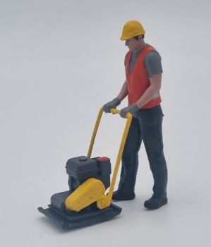ATLAN32050 - Operaio edile con una piastra vibrante compattatrice