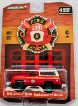 GREEN67050-DVERT - Chevrolet M1009 Alaska Fire Department del 1984 con cerchi verdi della serie FIRE & RESCUE in confezione blister