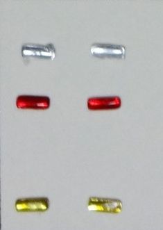 ART04370J - 2 cuscinetti per fari rettangolari gialli 1x3 mm